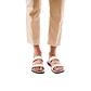 Model wearing Golan white, handmade leather sandals with back strap 