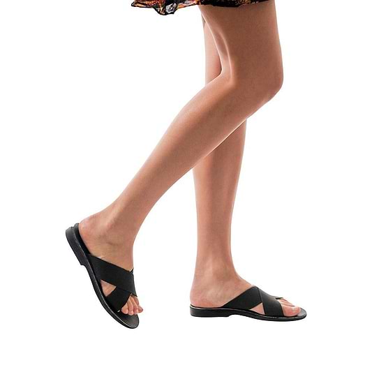 Model wearing Isla black suede, handmade leather slide sandals