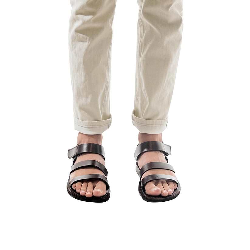 Model wearing Jared brown, handmade leather sandals with back strap and toe loop