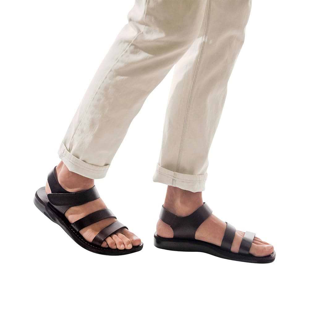 Model wearing Jared brown, handmade leather sandals with back strap and toe loop