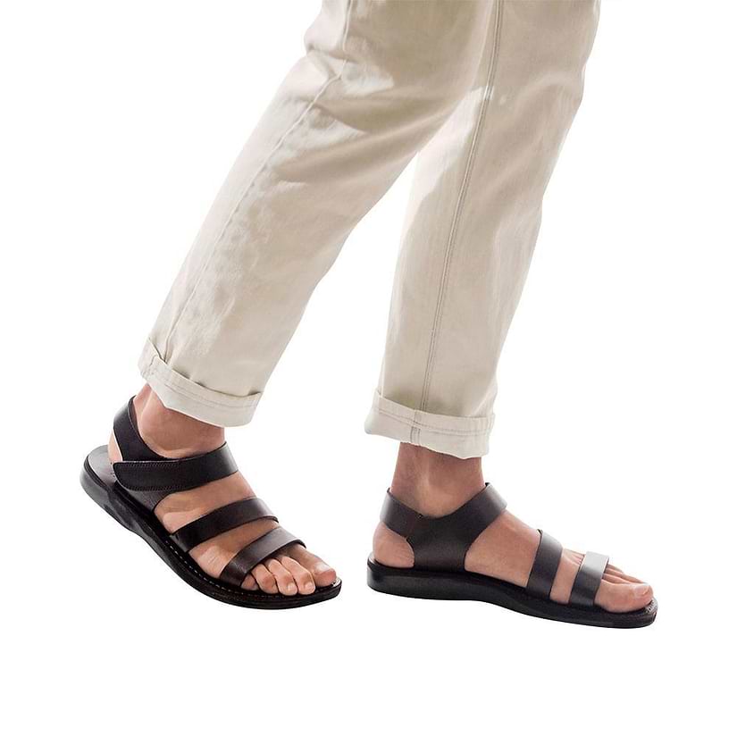 Model wearing Jared brown, handmade leather sandals with back strap and toe loop
