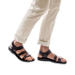 Model wearing Jared brown, handmade leather sandals with back strap and toe loop