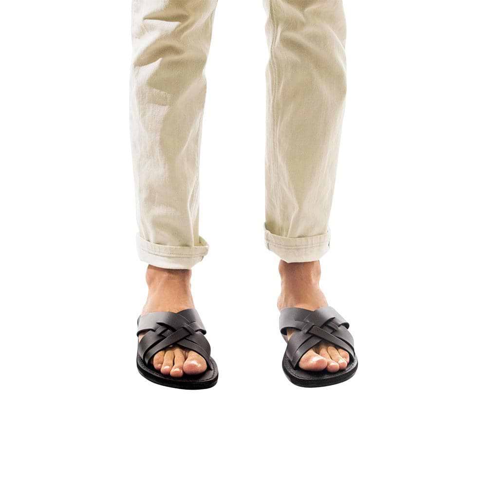 Model wearing Jesse black, handmade leather slide sandals - Front View