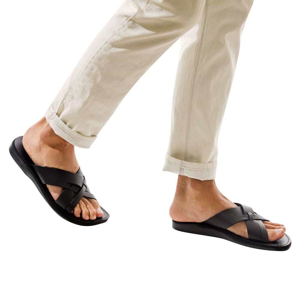 Model wearing Jesse black, handmade leather slide sandals - Front View