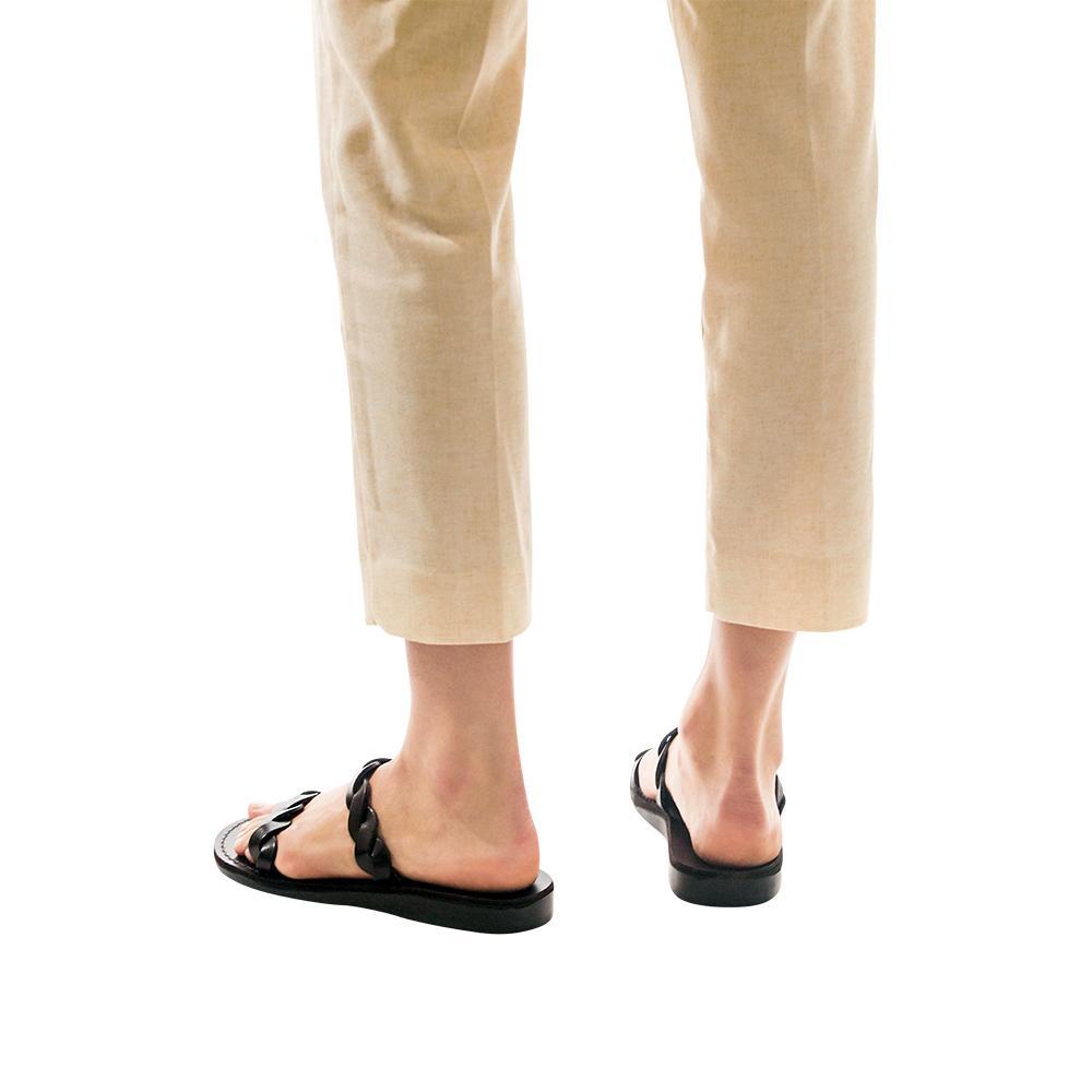 Model wearing Joanna brown, handmade leather slide sandals