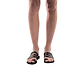 Model wearing Layla brown, handmade leather slide sandals with toe loop