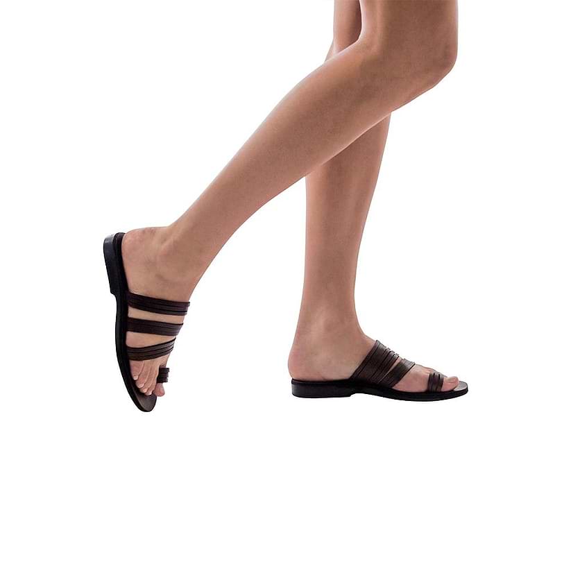 Model wearing Layla brown, handmade leather slide sandals with toe loop