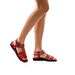 Model wearing Leah red, handmade leather sandals with back strap  