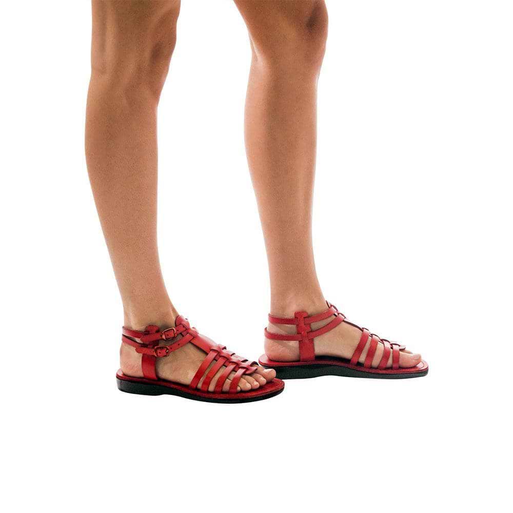 Model wearing Leah red, handmade leather sandals with back strap  