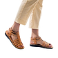 Model wearing Leah tan, handmade leather sandals with back strap  