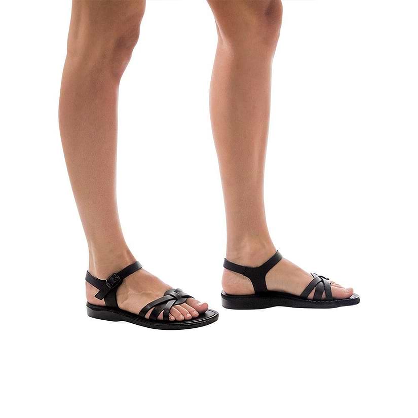 Model wearing Miriam black, handmade leather sandals with back strap  