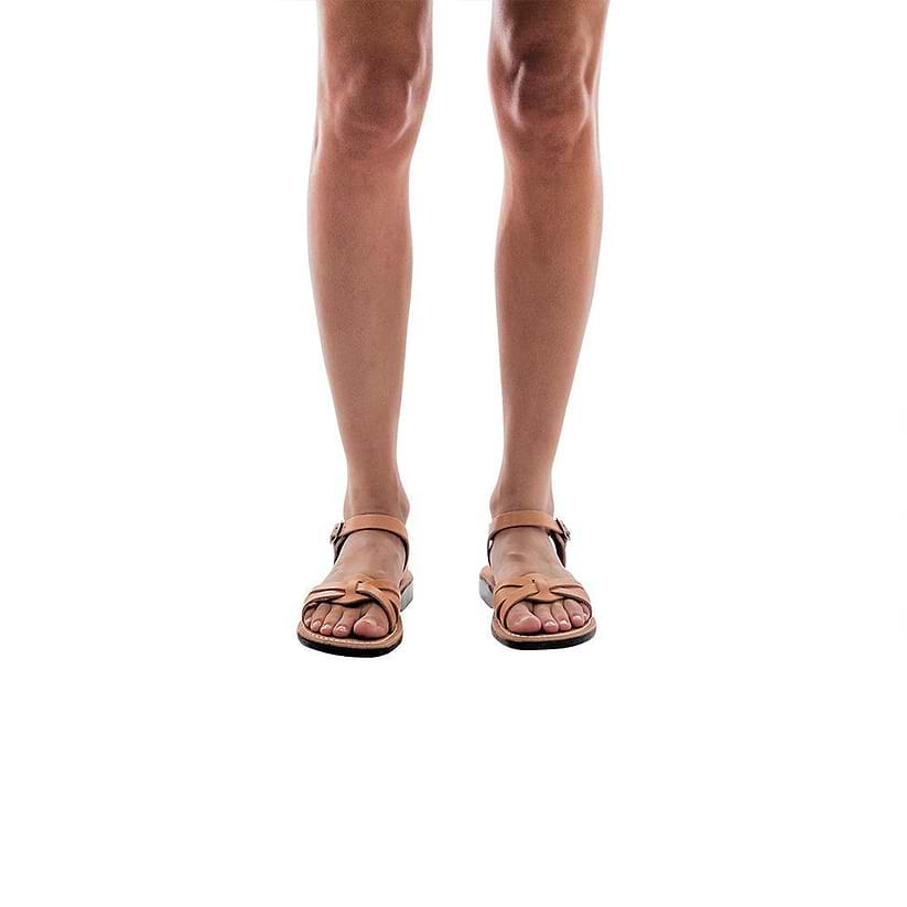 Model wearing Miriam tan, handmade leather sandals with back strap  