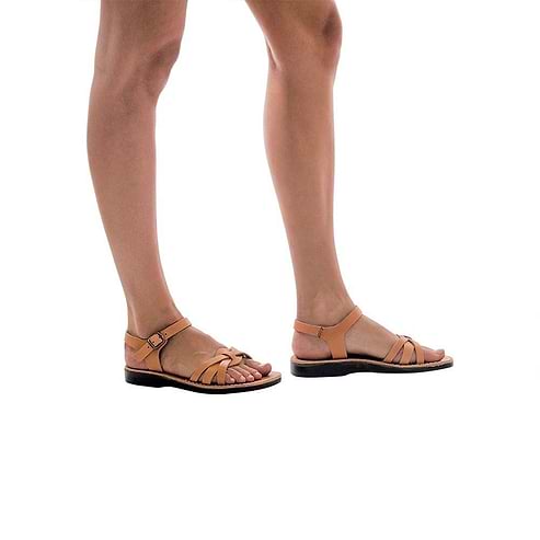 Model wearing Miriam tan, handmade leather sandals with back strap  