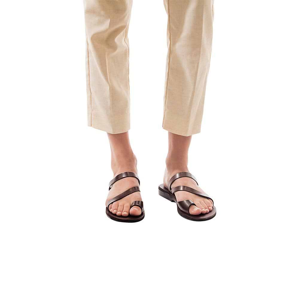 Model wearing Noah brown, handmade leather slide sandals with toe loop 