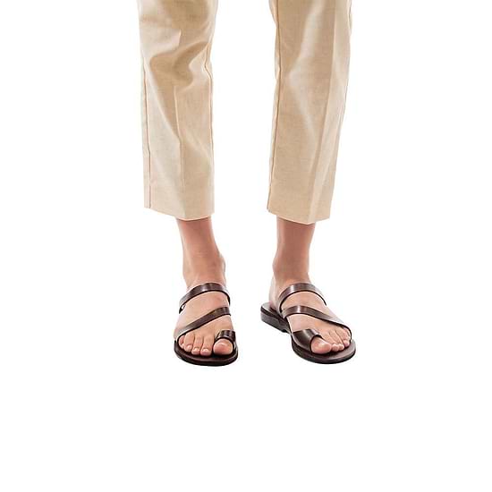 Model wearing Noah brown, handmade leather slide sandals with toe loop 