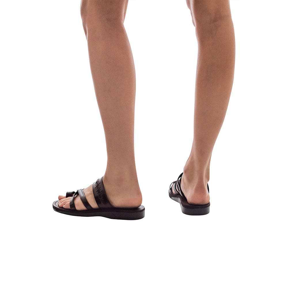 Model wearing Rachel Brown , handmade leather slide sandals with toe loop