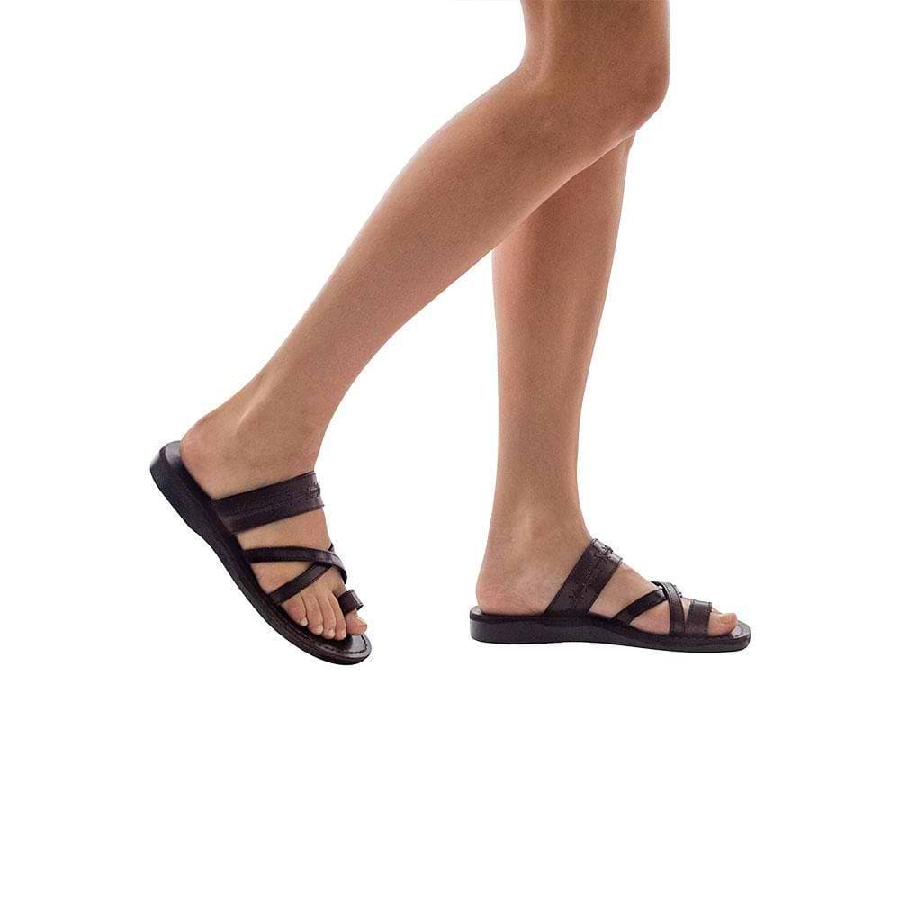 Model wearing Rachel Brown , handmade leather slide sandals with toe loop