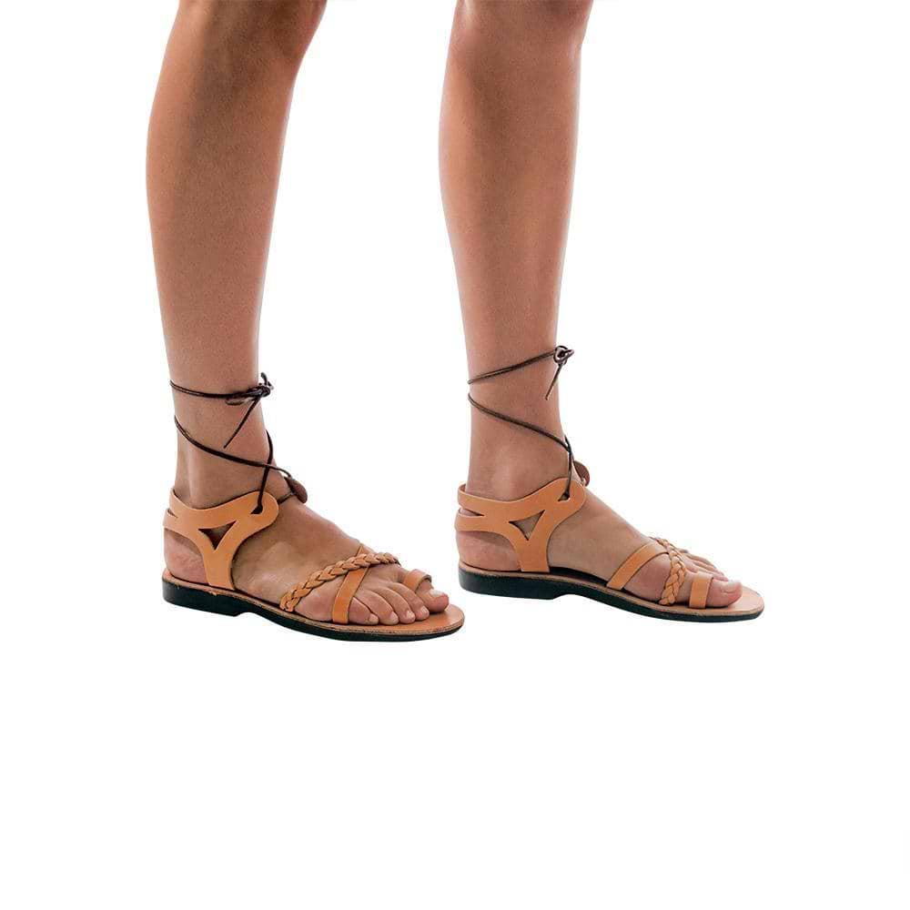 Model wearing Ramah Tan, handmade leather sandals with back strap and toe loop