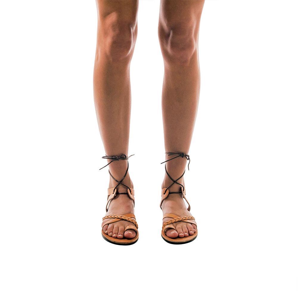 Model wearing Ramah Tan, handmade leather sandals with back strap and toe loop