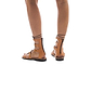 Model wearing Rebecca tan, handmade leather sandals with back strap  