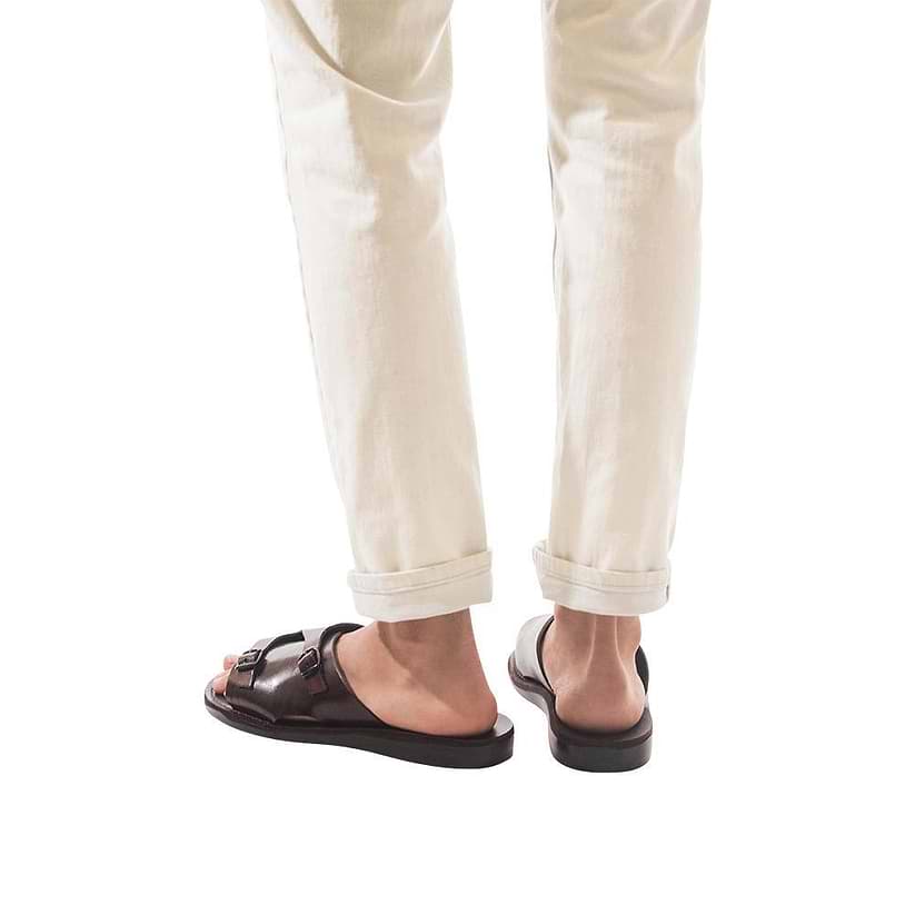 Model wearing Seth Brown, handmade leather slide sandals