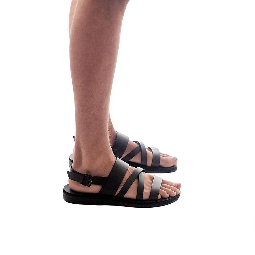 Model wearing Silas black, handmade leather sandals with back strap 
