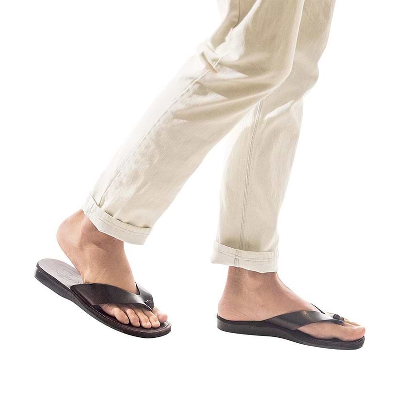 Model wearing Solomon brown, handmade leather slide sandals 
