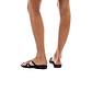 Model wearing Tamar black, handmade leather slide sandals 