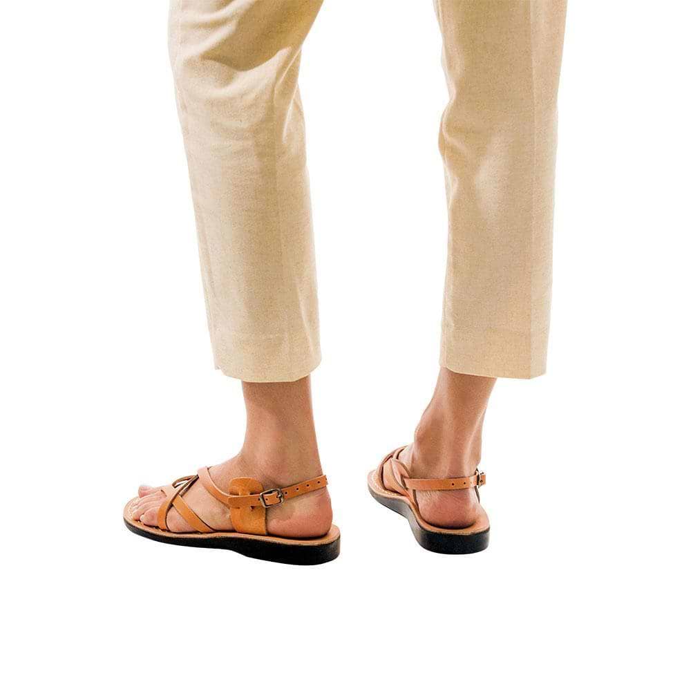 Model wearing Tamar Buckle tan, handmade leather sandals with back strap