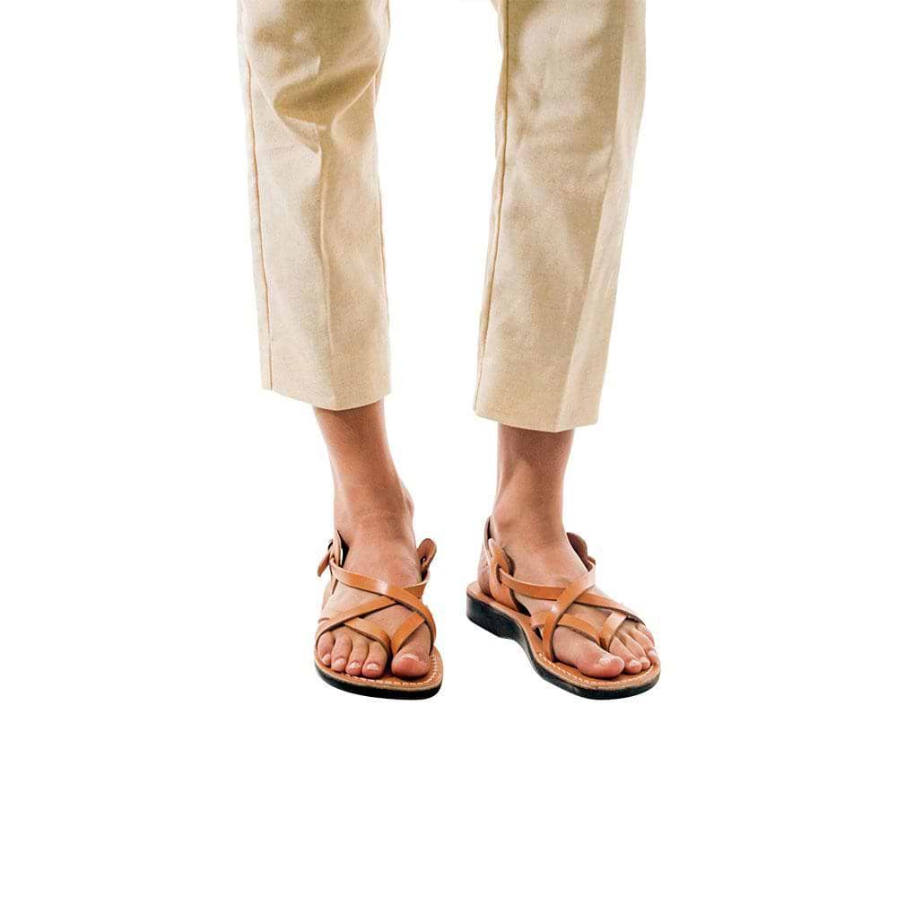 Model wearing Tamar Buckle tan, handmade leather sandals with back strap