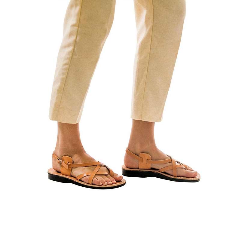 Model wearing Tamar Buckle tan, handmade leather sandals with back strap