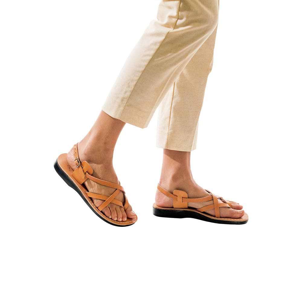 Model wearing Tamar Buckle tan, handmade leather sandals with back strap