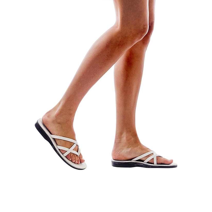 Model wearing Tamar white, handmade leather slide sandals 