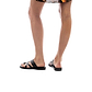 Model wearing The Good Shepherd black, handmade leather slide sandals with toe loop