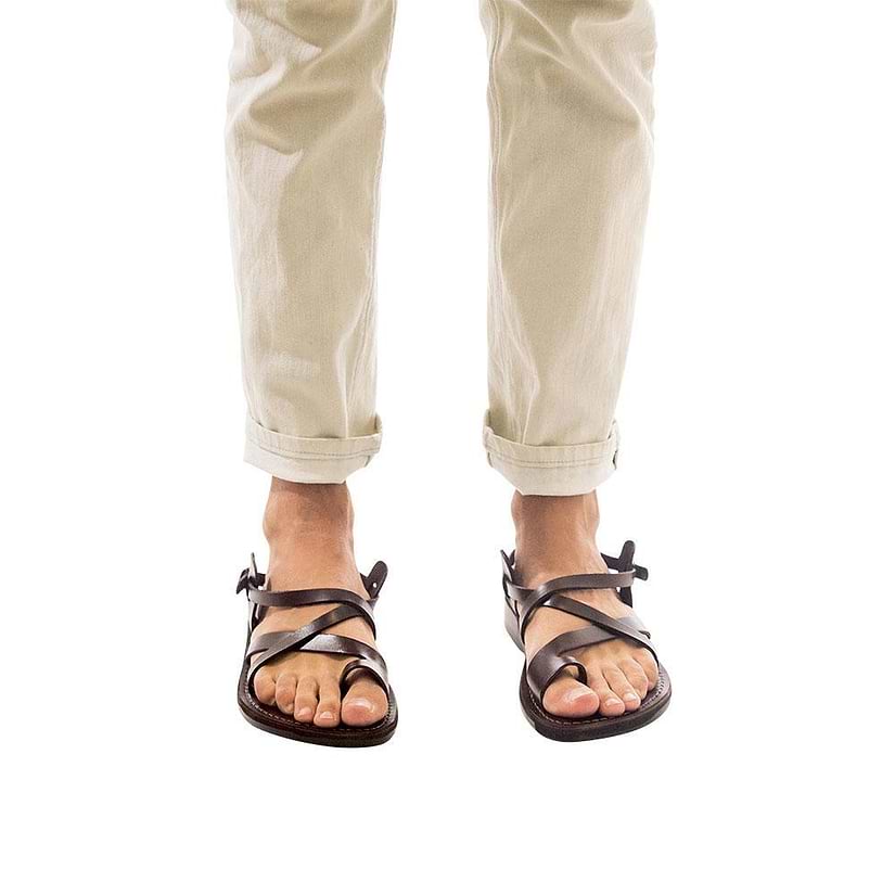 Model wearing The Good Shepherd Buckle brown, handmade leather sandals with back strap and toe loop