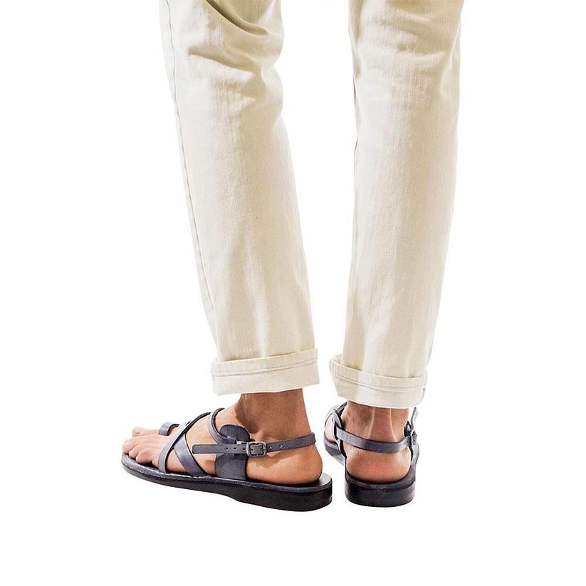 Model wearing The Good Shepherd Buckle gray, handmade leather sandals with back strap and toe loop