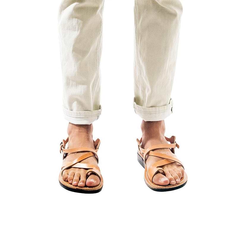 Model wearing The Good Shepherd Buckle tan, handmade leather sandals with back strap and toe loop