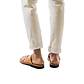 Model wearing The Good Shepherd tan, handmade leather slide sandals with toe loop