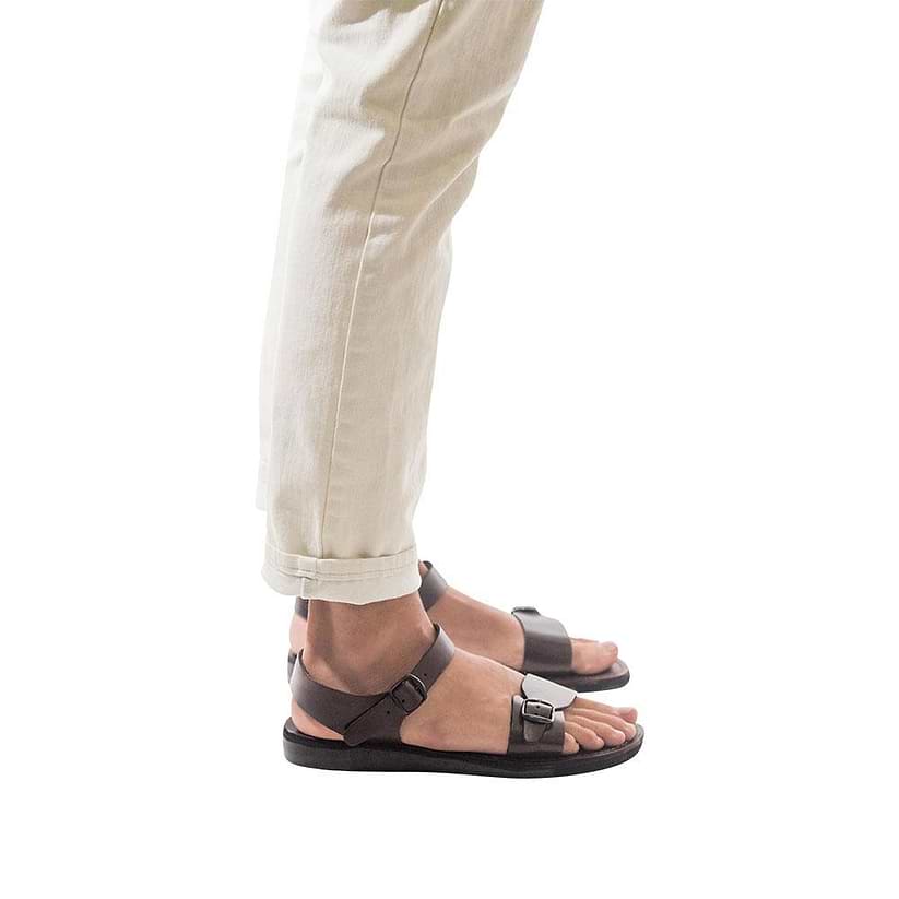 Model wearing The Original brown, handmade leather sandals with back strap 