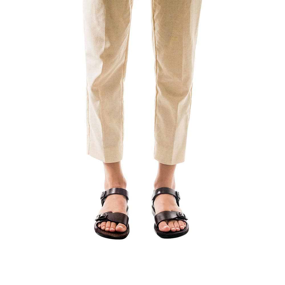 Model wearing The Original brown, handmade leather sandals with back strap 