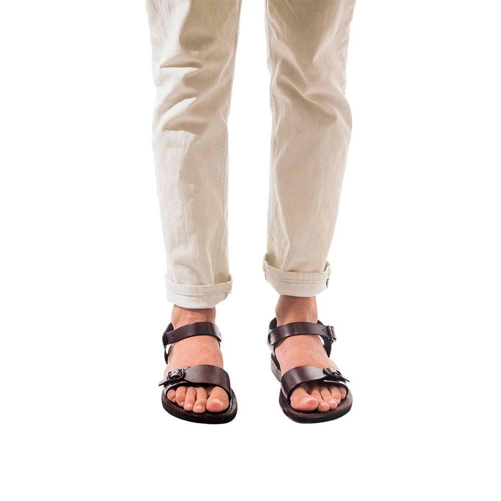 Model wearing The Original brown, handmade leather sandals with back strap 