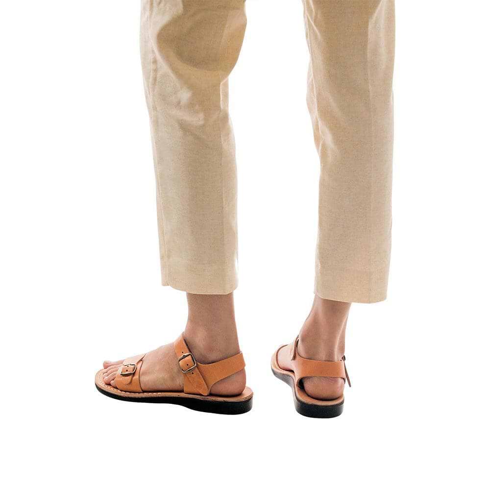 Model wearing The Original tan, handmade leather sandals with back strap 