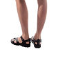 Model wearing Tovah black, handmade leather sandals with back strap and toe loop  - Front View
