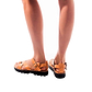 Model wearing Tovah tan, handmade leather sandals with back strap and toe loop  