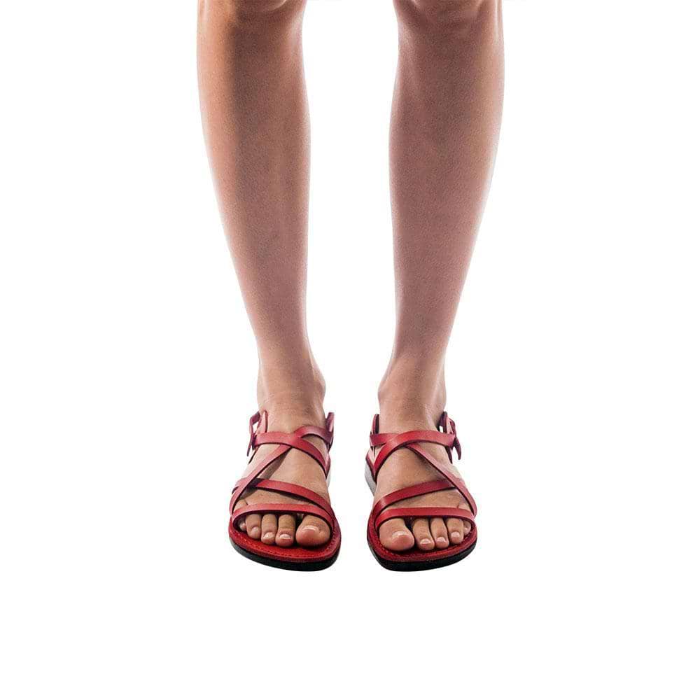 Model wearing Tzippora brown, handmade leather sandals with back strap