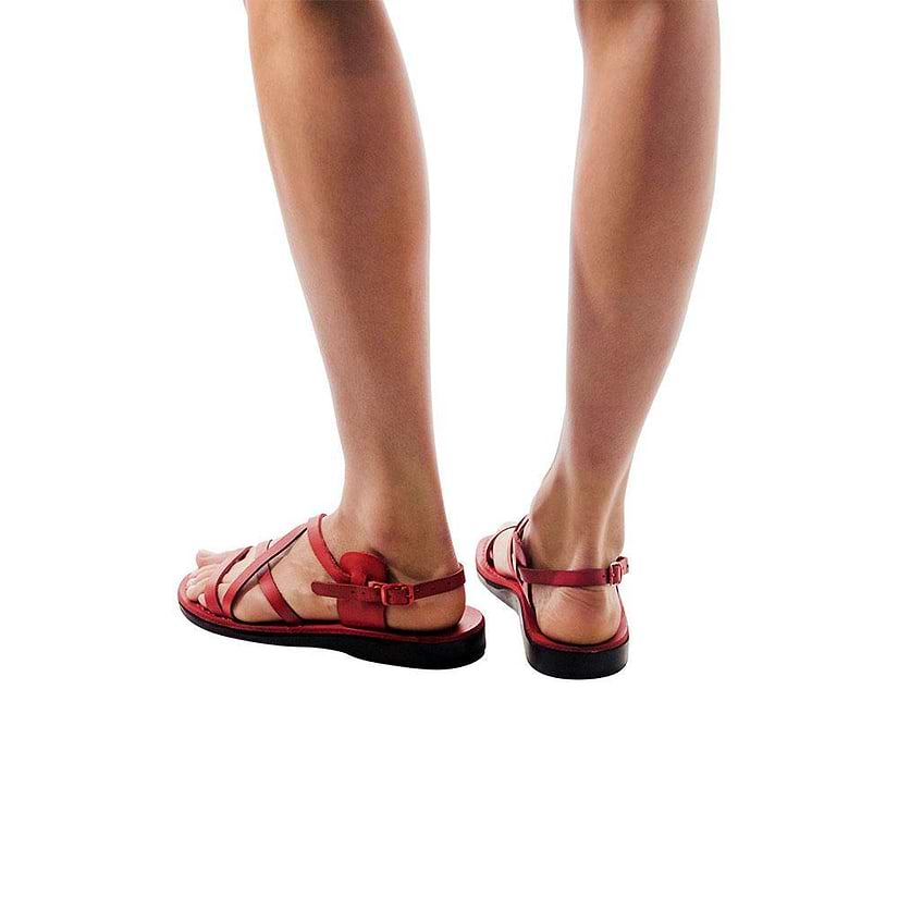 Model wearing Tzippora brown, handmade leather sandals with back strap