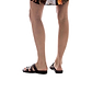 Model wearing Zoey brown, handmade leather slide sandals with toe loop 