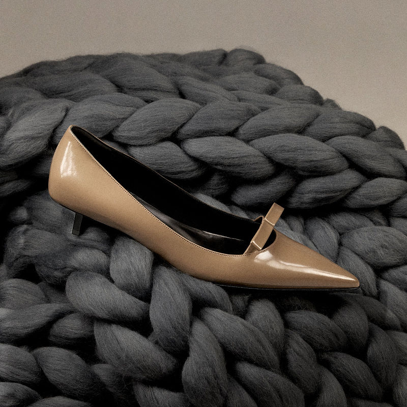 Still life, nude shoe on wool