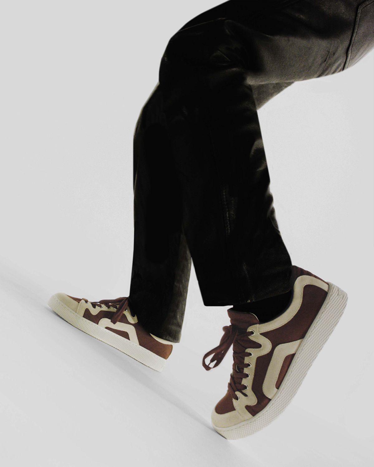 Alpha Sneaker close-up, brown colourway, three-quarter view