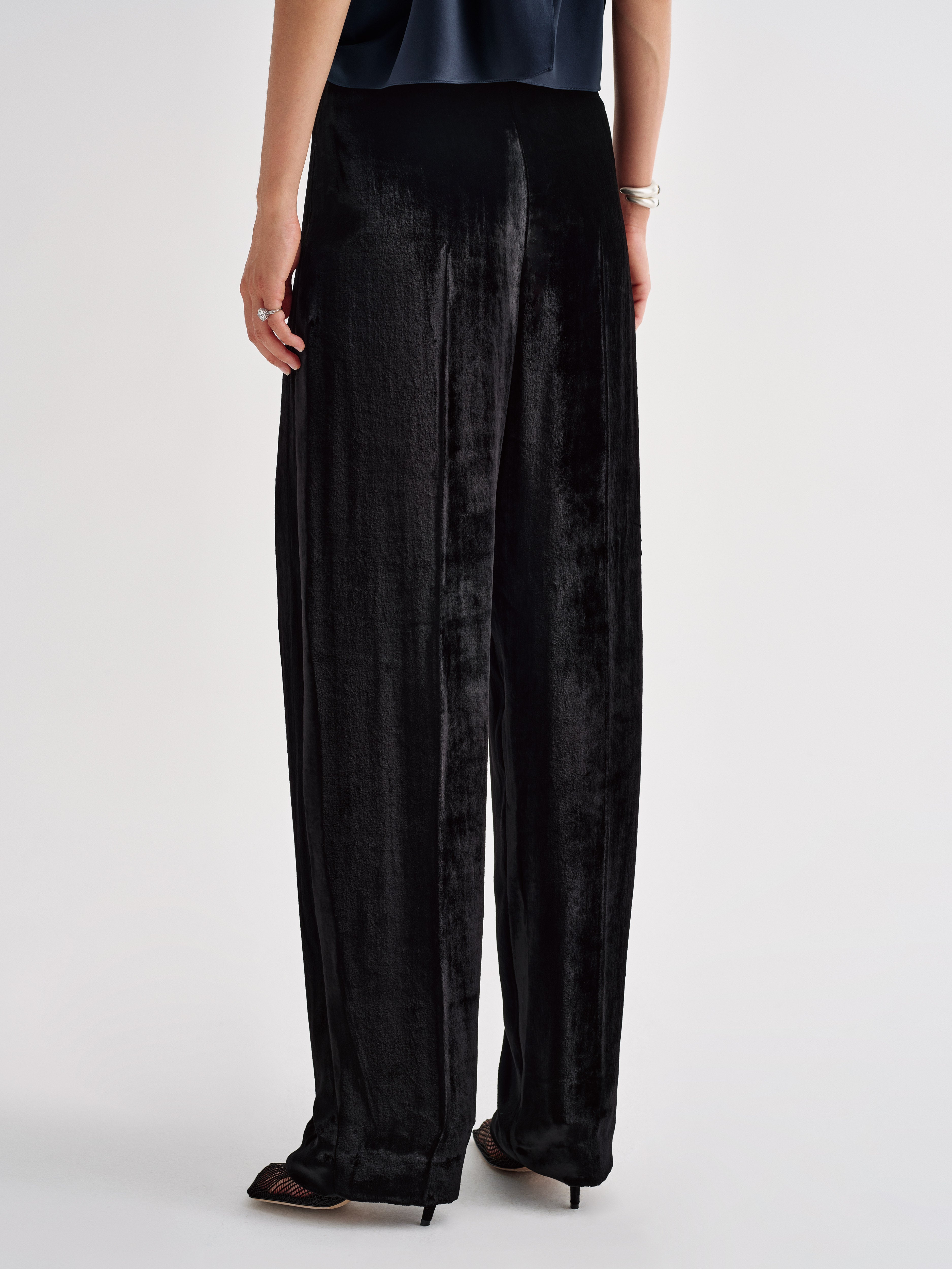 AFLALO Ellis Pant in Velvet, Black, back view on model